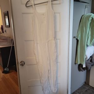 White jumpsuit cloth and stone